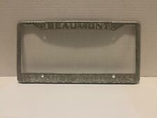 Vintage Beaumont Coffer Motors Metal License Plate Frame picture