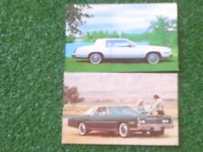 2 GROUP LOT RPPC POSTCARD 1976 & 1979 CADILLAC picture
