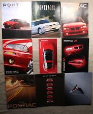 NOS Pontiac 1991, 92, 93, 94, 95, 96, 97, 98, 03 (9) Full Line Brochures Lot picture