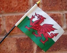 WALES flag PACK OF TEN SMALL HAND WAVING FLAGS WELSH Swansea LLandudno Barmouth picture