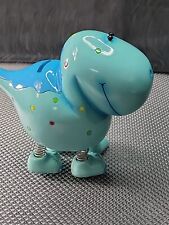 Resin Toy Bank Smiling Blue Polka Dotted Dinosaur With Spring Leg 7x6.5x3 In. picture