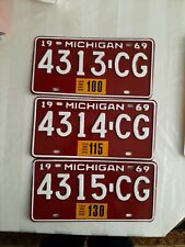 Lot of 3 1969 Michigan License plates NOS.  picture