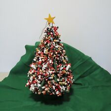 UNIQUE CHRISTMAS TREE DECORATED WITH WOOD CHILDREN, SLEDS, SANTAS, SNOWMEN, ETC picture