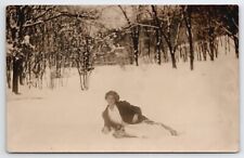 RPPC Edwardian Woman Lying In Snow Sweet Smile c1910 Real Photo Postcard A48 picture