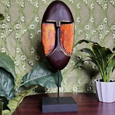 African Brown & Metallic Orange Face Mask Statue picture