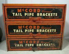 Vintage McCord Universal Tail Pipe Bracket Muffler Clamps 3-Drawer Metal Cabinet picture