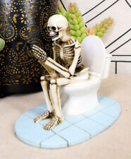 Ebros Eternally Constipated Skeleton On Toilet Bowl Browsing Cellphone Figurine picture