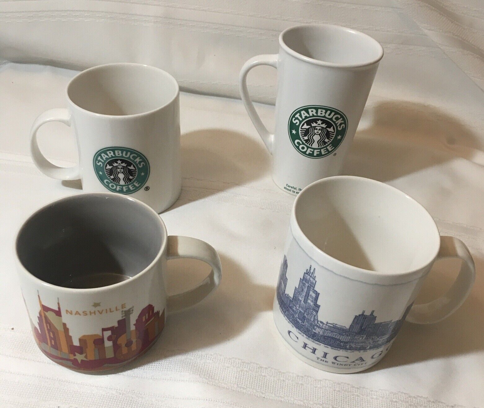 Lot Of 4 Starbucks Coffee Mugs, 14oz,16oz, 18oz, and 16oz-2001,2005,2007.