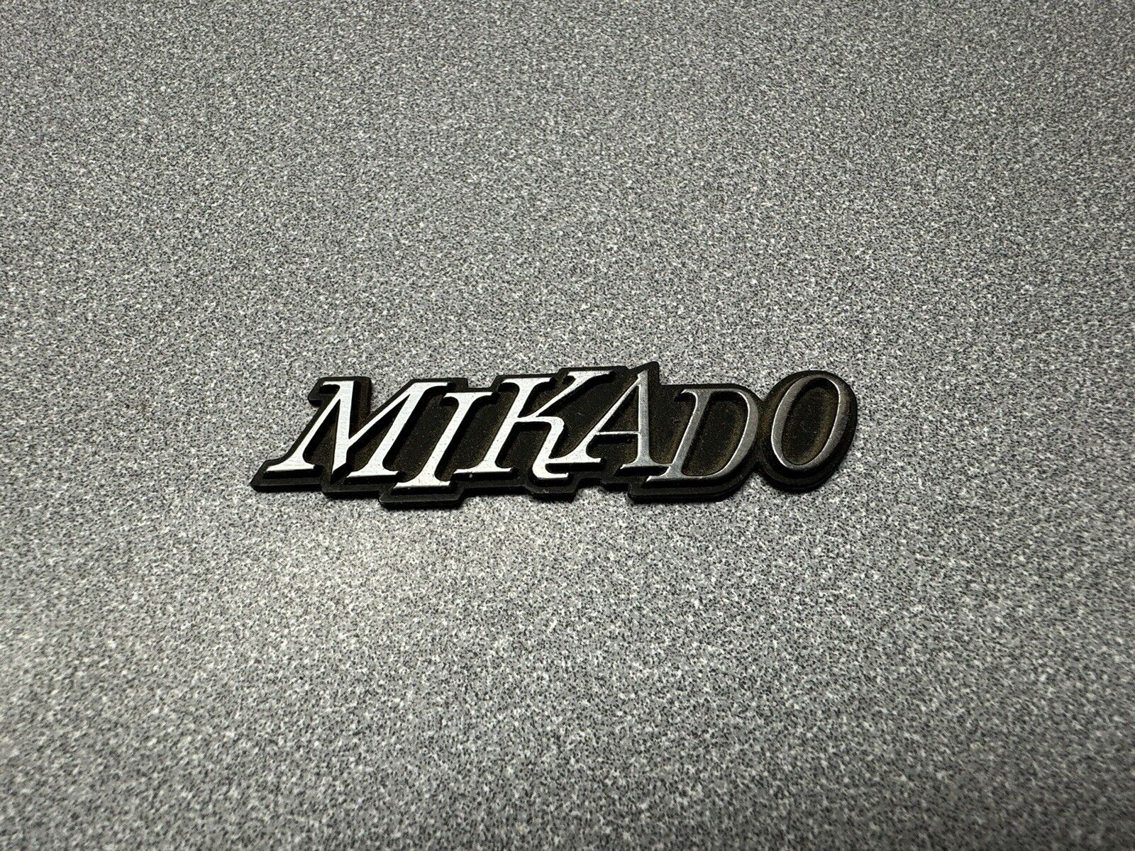 Chevrolet LUV Mikado Glovebox Door Emblem OEM 78–80