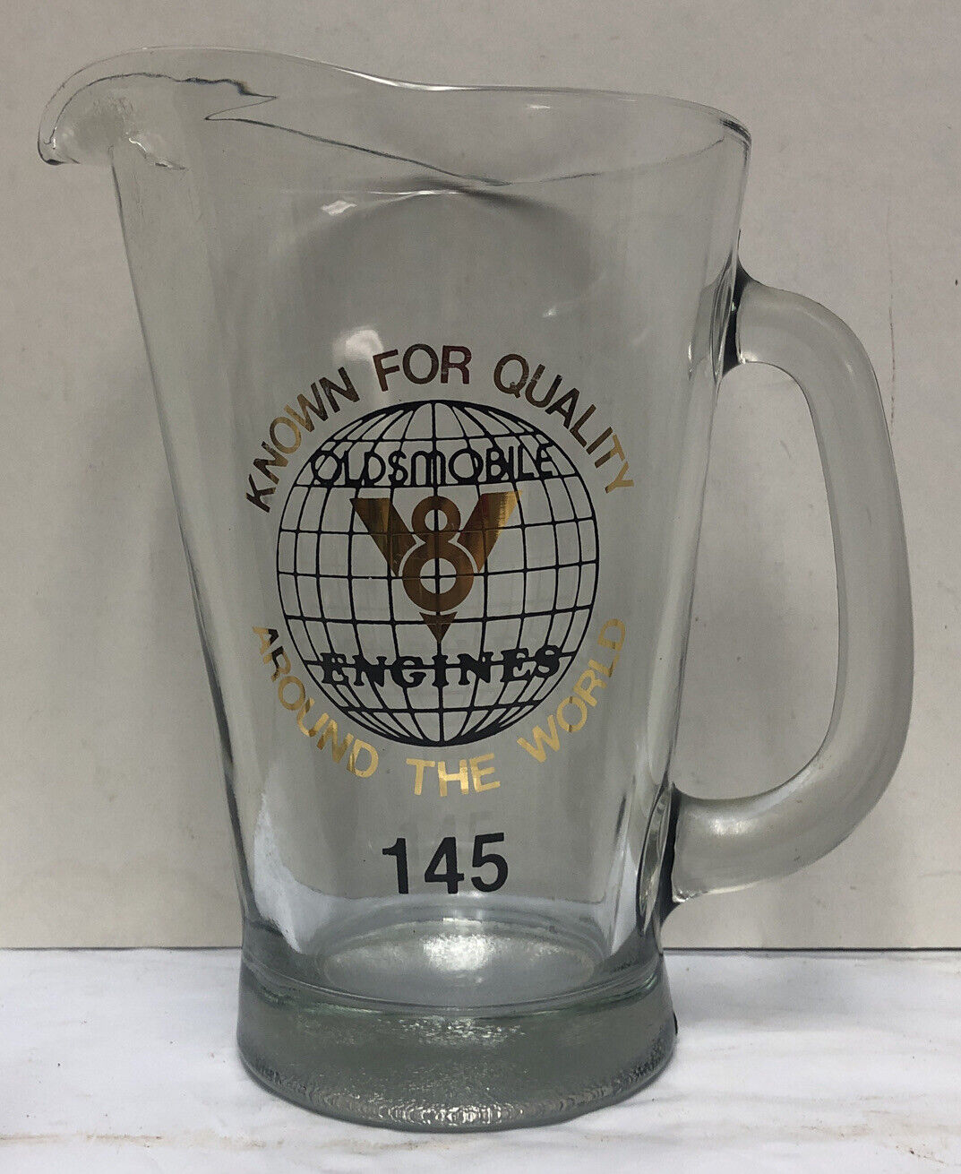 OLDSMOBILE V8 Glass Pitcher “Known For Quality Around The World” vintage USA 23K
