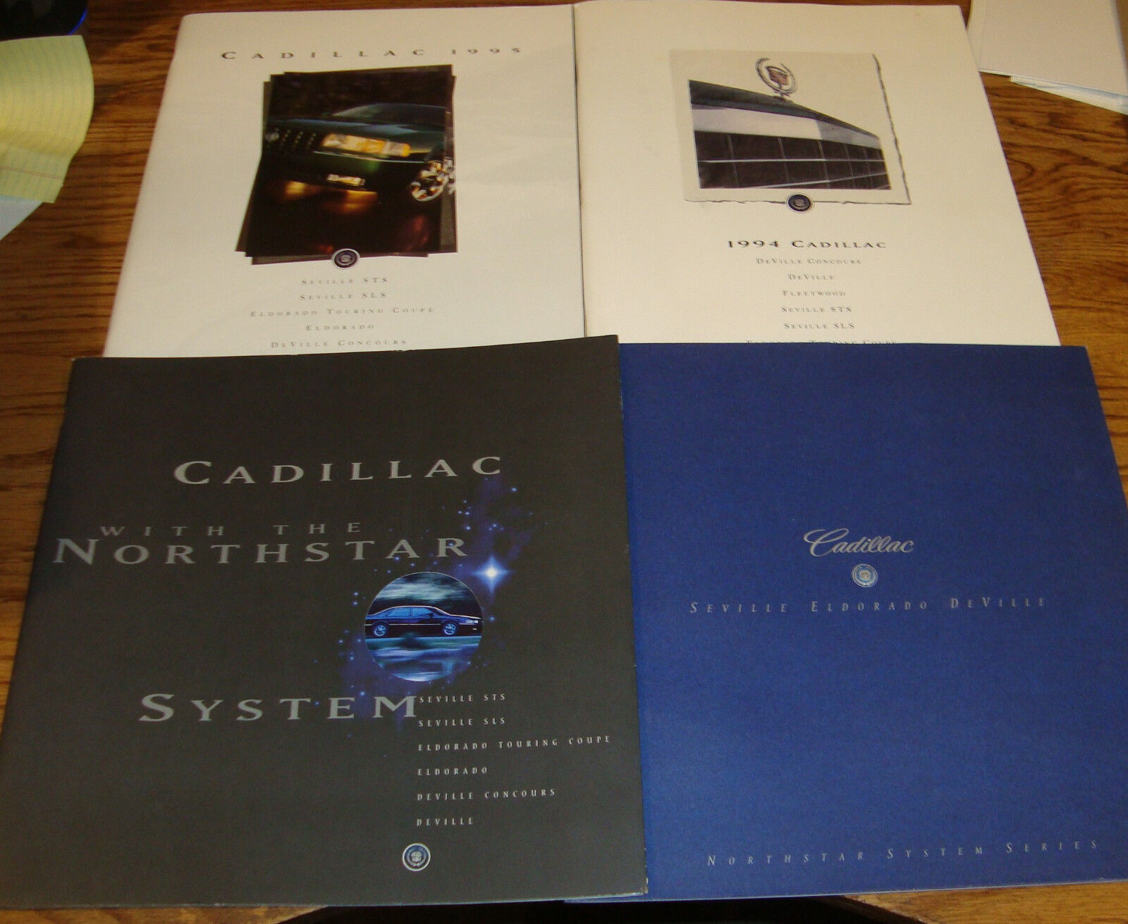 Original 1994 1995 1996 1997 Cadillac Full Line Deluxe Sales Brochure Lot of 4