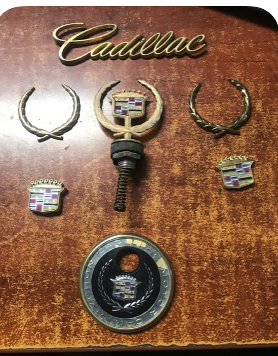 1997 Cadillac Deville  Hood Ornament with wreaths, Emblems, roof emblem