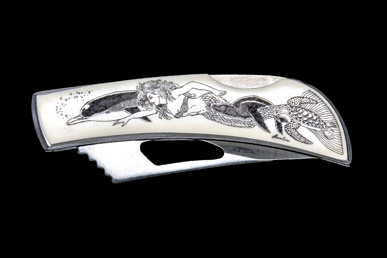 Frolicking Etched Mermaid Stainless Steel Silver Hawk Knife.  Acrylic Resin
