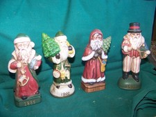 4 Santa's Dated 1885-1906-1910-1912 Different outfits picture
