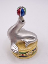 Vintage Estée Lauder Solid Perfume Compact  Juggling Seal   2000 Dazzling Silver picture