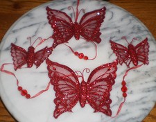 ~~ONE (1)  STRAND ~ BEAUTIFUL RED BUTTERFLY GARLAND~IMMEDIATE SHIPPING picture