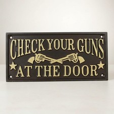 Check Your Guns at the Door Cast Iron Wall Plaque picture