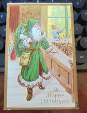 Vintage 1910s Christmas Postcard SANTA CLAUS in GREEN ROBE at House Window picture