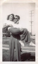 Young Man Lifting Holding Woman Front Yard 1940s Photo White Shirt Sunglasses picture