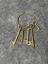 Antique-Style Brass Skeleton Keys on Large Metal Key Ring picture