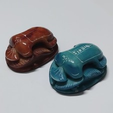 Handcrafted scarab beetle carvings blue and brown stone ancient Egyptian style picture