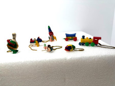 Vintage 1950-1960's Gumball Toy Puzzle Key Chains Lot of 7 including Rocket Ship picture