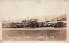 RPPC Rawlins Wyoming Baker’s De Luxe Tourist Camp Gas Station Photo Postcard G7 picture