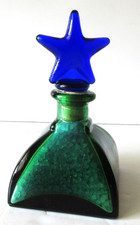 Vintage Green Art Glass Bottle With Cobalt Blue Star Stopper With Bath Salts picture