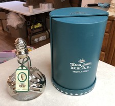 Tequila Añejo Don Julio Real Empty Bottle with Rotating Case picture