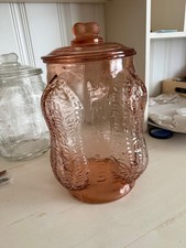 VINTAGE PLANTERS MR. PEANUT PINK DEPRESSION GLASS JAR W LID picture
