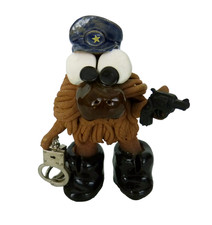 Vintage Harrie Co. Whimsical Clay Sculpted Policeman With Handcuffs Figurine picture