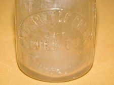VINTAGE SANITARY ICE CREAM  & MILK CO ITHACA NY HALF PINT   MILK BOTTLE picture