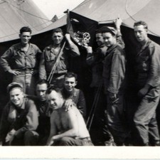 c1940s WWII US Army Soldiers Skull Jolly Roger Flag Tent Camp Snapshot Photo Vtg picture