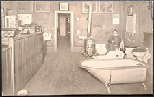 1910 Spokane WA Plumbing Supply Interior RPPC – Bathtub Stove Toilet Display picture