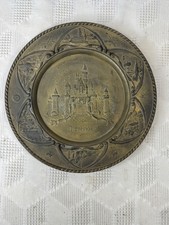 Vintage Disneyland Brass Souvenir Plate Featuring Sleeping Beauty Castle 1950s picture
