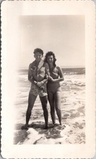 Smiling Couple Man Woman in Swimsuits Beach Ocean Photograph Snapshot Photo picture