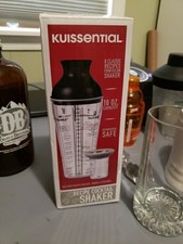 Cocktail shakers. Plastic with recipes printed on the side and measurements. picture