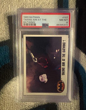 Topps 1989 Batman Taking Aim at the Batwing #107 Non-Sport Card PSA 8 picture