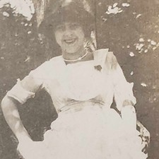 Vintage Snapshot Photo Playful Dress Woman Posing By Tree picture