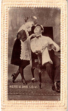 Romance - Woman in Maid's outfit - Here's one I.O. U.  - Embossed - 1911 picture