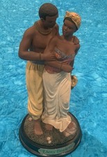 Ebony Treasures by United Treasures standing couple in traditional garb picture