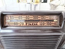 The item pictured is a vintage FADA Model 605 AM tube table radio, manufactured picture