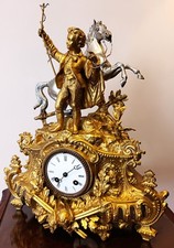ANTIQUE FRENCH GILT MANTEL CLOCK. picture