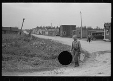 Photo:Minnesota 1937 FSA Man Carrying Bucket Rural Street Scene picture