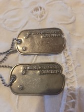  2 Identical Notched Military Dog Tags With 