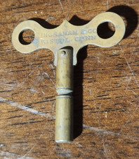 • Antique E. Ingraham & Co Brass Clock  Antique Ingraham & Co./Bristol Clock Key picture