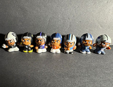 NFL Mini Plastic Football Player Figurines 7-Pack Mixed Teams picture
