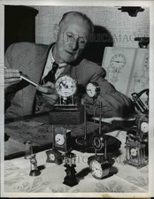 1959 Press Photo of S.J. Wise with his model timepieces. - nee07201 picture