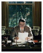 PRESIDENT RONALD REAGAN READING PAPERS IN OVAL OFFICE PORTRAIT 8X10 PHOTO picture