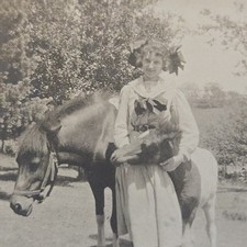 Vintage B&W RPPC Photo Postcard of Young Woman Posing w/ Horse & Foal picture